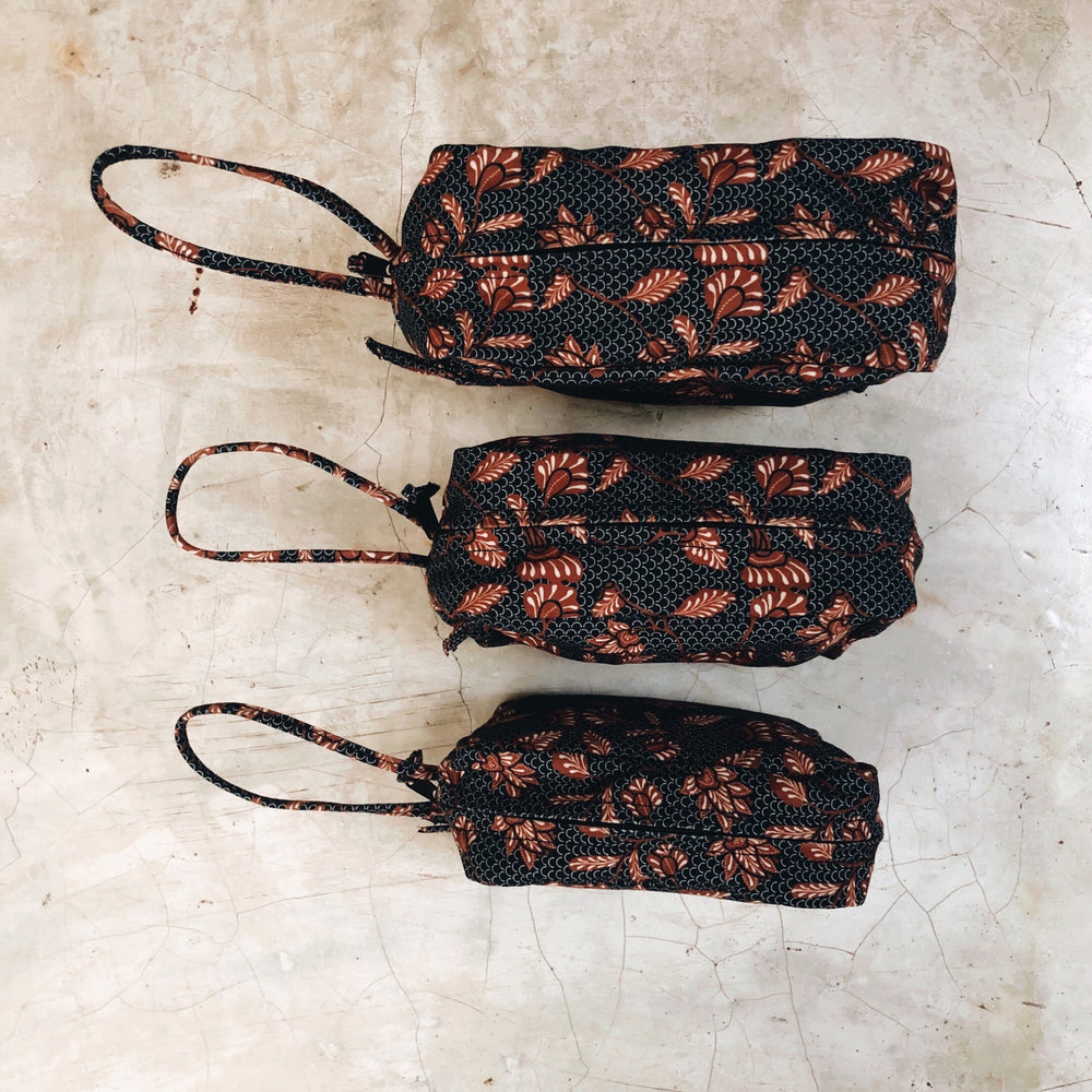 
            
                Load image into Gallery viewer, Black + Tan Batik | Travel Bag SMALL
            
        